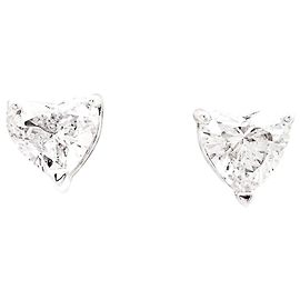 Autre Marque White gold and heart diamond stud earrings. Other