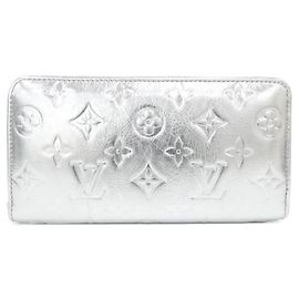 Cartera Louis Vuitton Monogram Coussin Zippy Plata
