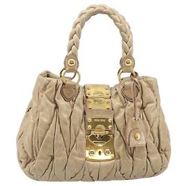 Sac Convertible Coffer Miu Miu en Cuir Matelassé Medium Beige