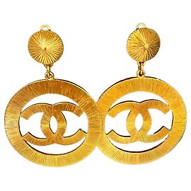 Boucles d'oreilles Chanel CC Dorées Doré
