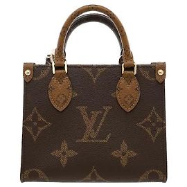 Louis Vuitton A tote bag where the iconic Monogram and Monogram Reverse canvas achieve a sensuous harmony. Light, highly durable canvas material combines with an angular silhouette for a sophisticated point, and Brown