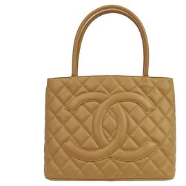 Chanel Medallion Quilted Caviar Beige
