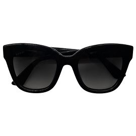 Occhiali da sole Gucci con montatura a farfalla nera e logo GG Nero