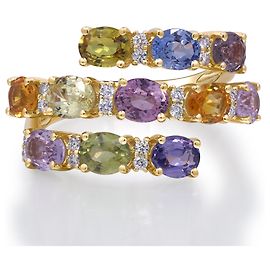 Autre Marque Anello Bypass arcobaleno in oro giallo, zaffiri e diamanti Altro