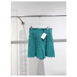 Jupe-short Balmain en tweed turquoise à boutons dorés Multicolore