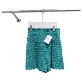 Saia-short Balmain em tweed turquesa com botões dourados Multicor