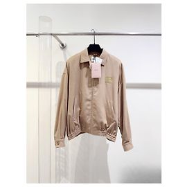 Veste Miu Miu en laine de chameau camel logo brodé or Multicolore