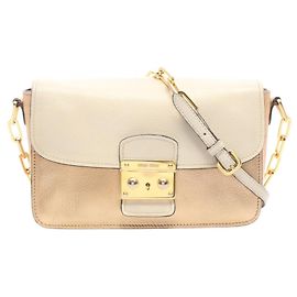 Bolsa Miu Miu em dourado e marfim Dourado Cru