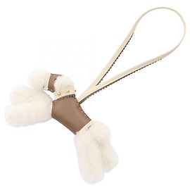 Hermès Acessório de bolsa Hermes Buddy Charm Marrom Branco Taupe