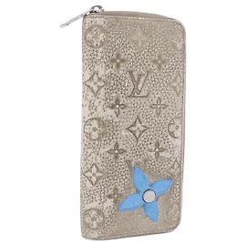 LOUIS VUITTON Taurillon Clemence Climbing Zippy Wallet Vertical Auth 204062 Cream