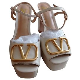 Valentino Garavani Sandales compensées VLogo en cuir blanc Blanc