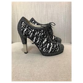 Botas Chanel tweed T.37,5 Negro