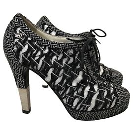 Botas Chanel tweed T.37,5 Preto