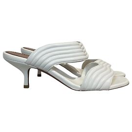 Alaïa Mules Alaia bianche T.38 Bianco
