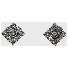 Autre Marque Boucles d'oreilles Stone en or blanc Métallisé