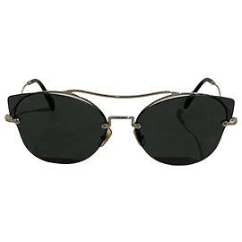 Gafas Miu Miu doradas Dorado