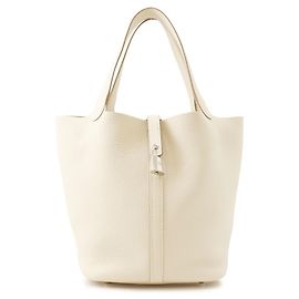 Hermès Bolsa Hermes Picotin Lock MM em couro Taurillon Clemence Craie Outro