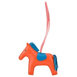 HERMÈS - Accessoire de sac Rodeo Hermès en cuir orange et bleu Orange