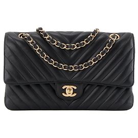 CHANEL - Classic/Timeless 11.12 Chanel Handtasche aus schwarzem glattem Chevron-Leder Schwarz