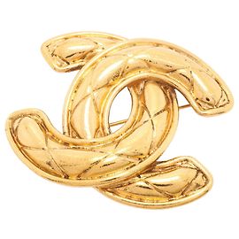 Broche Chanel chapado en oro Dorado