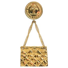 Spilla Chanel Gold CC placcata oro Quilted Flap Bag D'oro