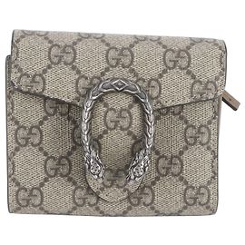 Cartera tri-fold de piel Gucci GG Supreme Dionysus Castaño