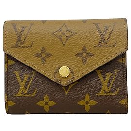 Cartera Tri-fold Louis Vuitton Monogram Reverse Portefeuille Victorine Castaño
