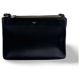 Céline Clutch Trio Zip de piel Celine Negro