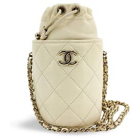 Bolsa Bucket Chanel com cordão e corrente em pele de cordeiro acolchoada Mini Dourado