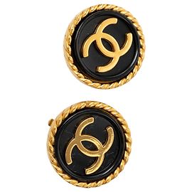 Boucles d'oreilles clips rondes émaillées Chanel CC plaquées or Doré