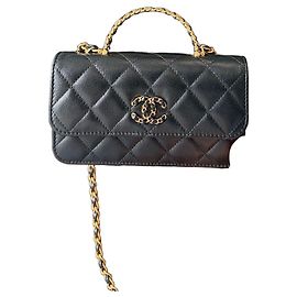 Bolsa Chanel Wallet on Chain em couro preto com alça de cristais Multicor