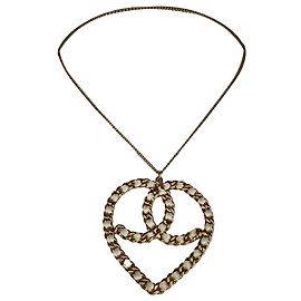 Collier Chanel à cœurs entrelacés en métal doré Doré
