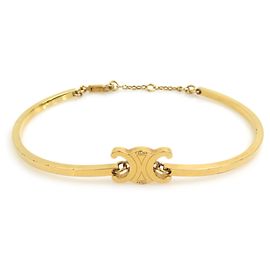 Céline Brazalete de Metal Dorado Celine Dorado