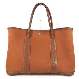Bolsa de ombro em couro e lona Garden Party PM da Hermès Laranja