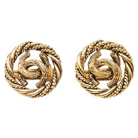 Brincos Chanel Coco Mark Round Twist Dourado