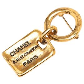 Spilla Chanel placcata in oro D'oro