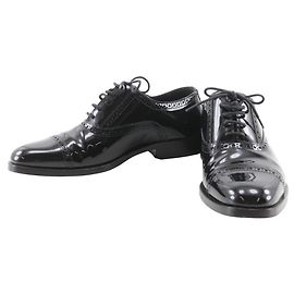 Yves Saint Laurent Scarpe stringate in pelle verniciata Saint Laurent Nero