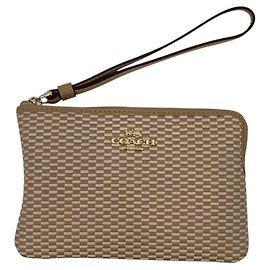 Cartera de muñeca Coach Corner Zip Beige
