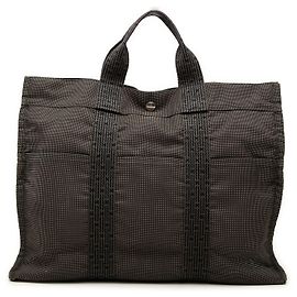Saco Tote Hermès Herline MM em lona cinza Cinza