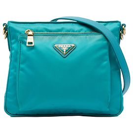 Bolsa Crossbody Prada em Tessuto azul com acabamento em Saffiano e fecho de correr Azul