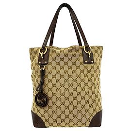 Saco Tote Gucci em lona e couro com padrão GG Marrom Bege