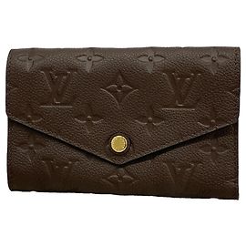 Portafoglio tri-fold Louis Vuitton color Earth Altro