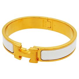 Bracelete Hermès Clic Clac PM em Ouro e Branco Branco Dourado