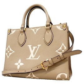 Borsa Louis Vuitton Monogram Empreinte Bicolor OnTheGo PM Grigio Crudo