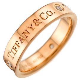 Autre Marque Anillo de banda plana Tiffany & Co. en oro rosa de 18K con diamantes Rosa