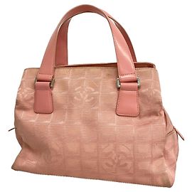 Bolso Chanel New Travel de nylon Rosa