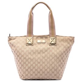 Tote Gucci in tela GG beige con banda Web Beige