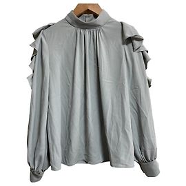 Autre Marque Blouse pullover à col montant et volants And Couture Bleu Bleu clair