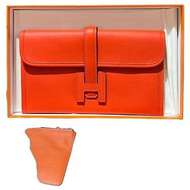 Clutch Hermès Constance em couro Laranja