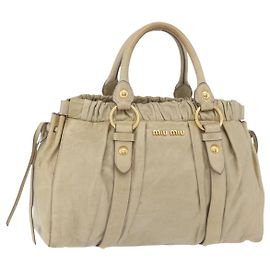 Bolso de mano Miu Miu de cuero beige y dorado Auth 206341A Beige Dorado